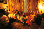 [PICTURE -Jon Jon, Dennis, Lendon, Galena, John Apple in living room]