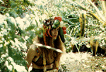 [PICTURE - Wendy by fish pond in back yard]